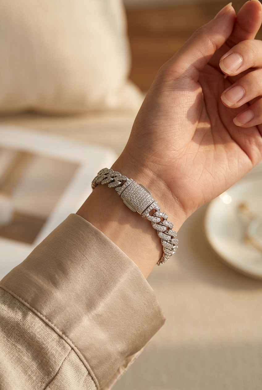 6mm VVS1 moissanite Cuban link bracelet in 925 sterling silver worn on a wrist, close-up, warm natural light